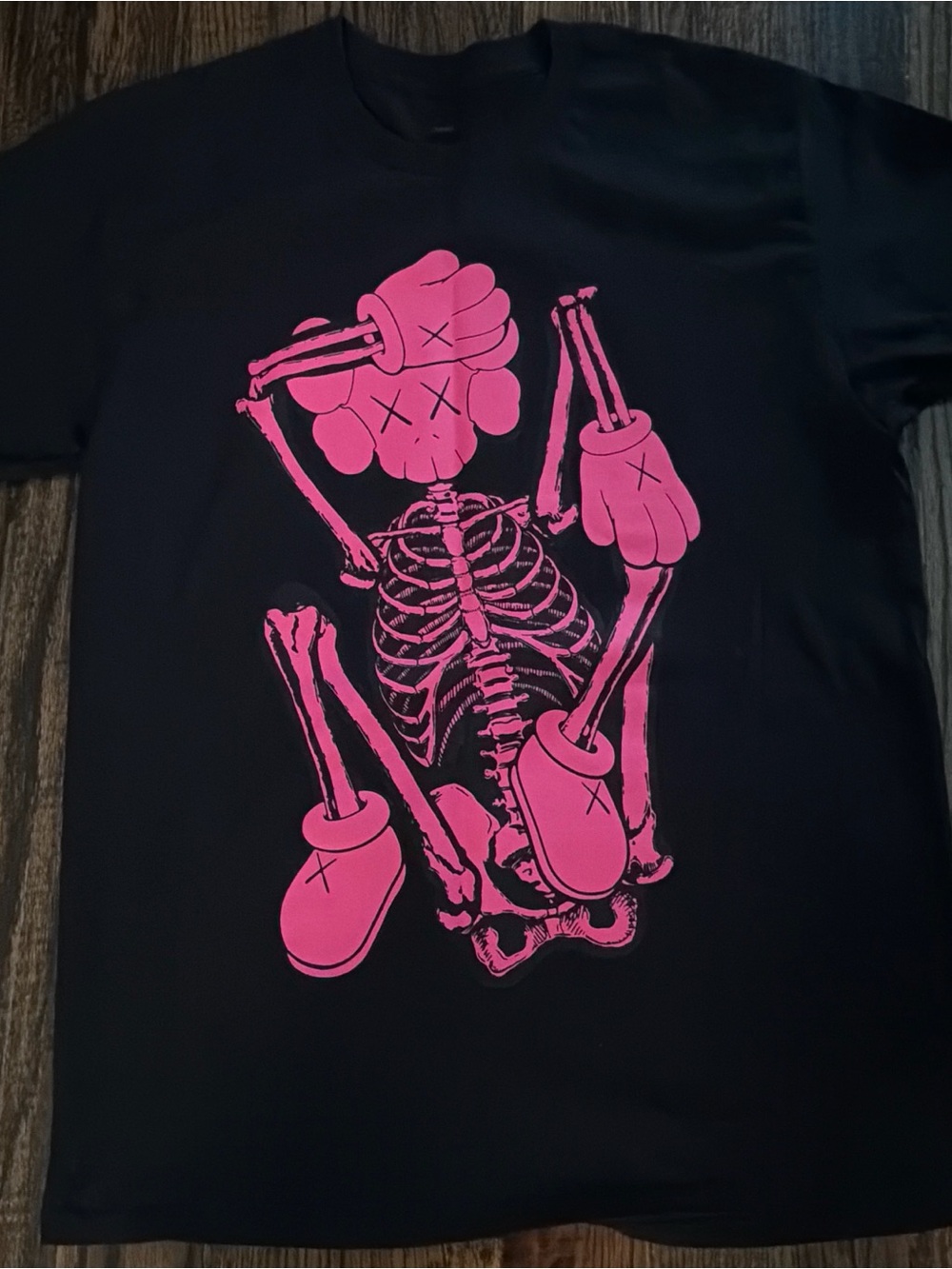KAWS Black Long Sleeve Tee with Pink Skeleton Graphic